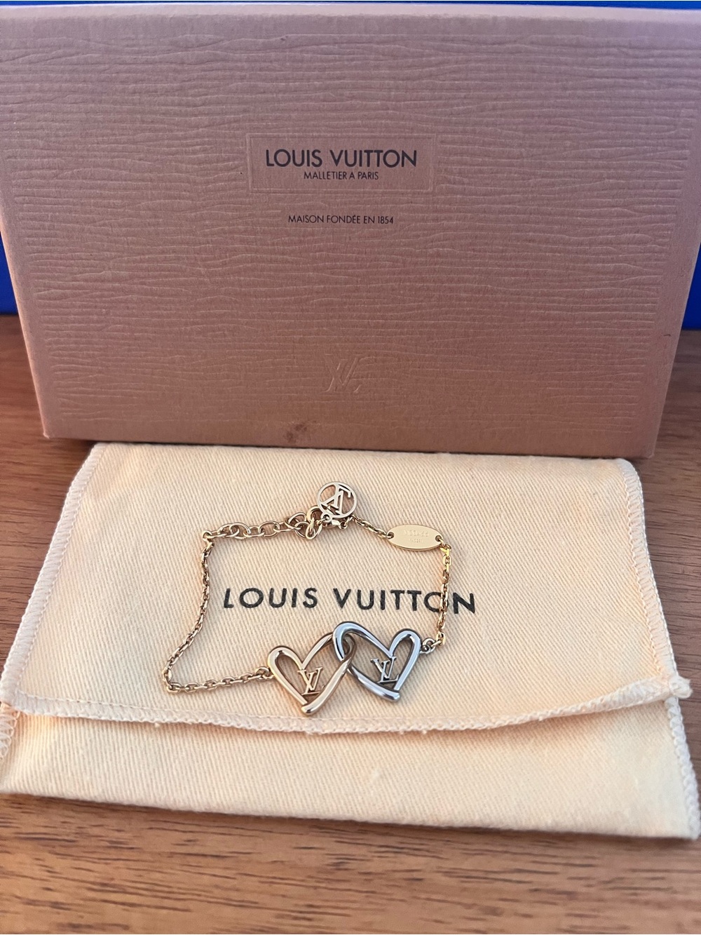 Louis Vuitton Two-Tone Heart Link Bracelet in Gold and Silver Tones